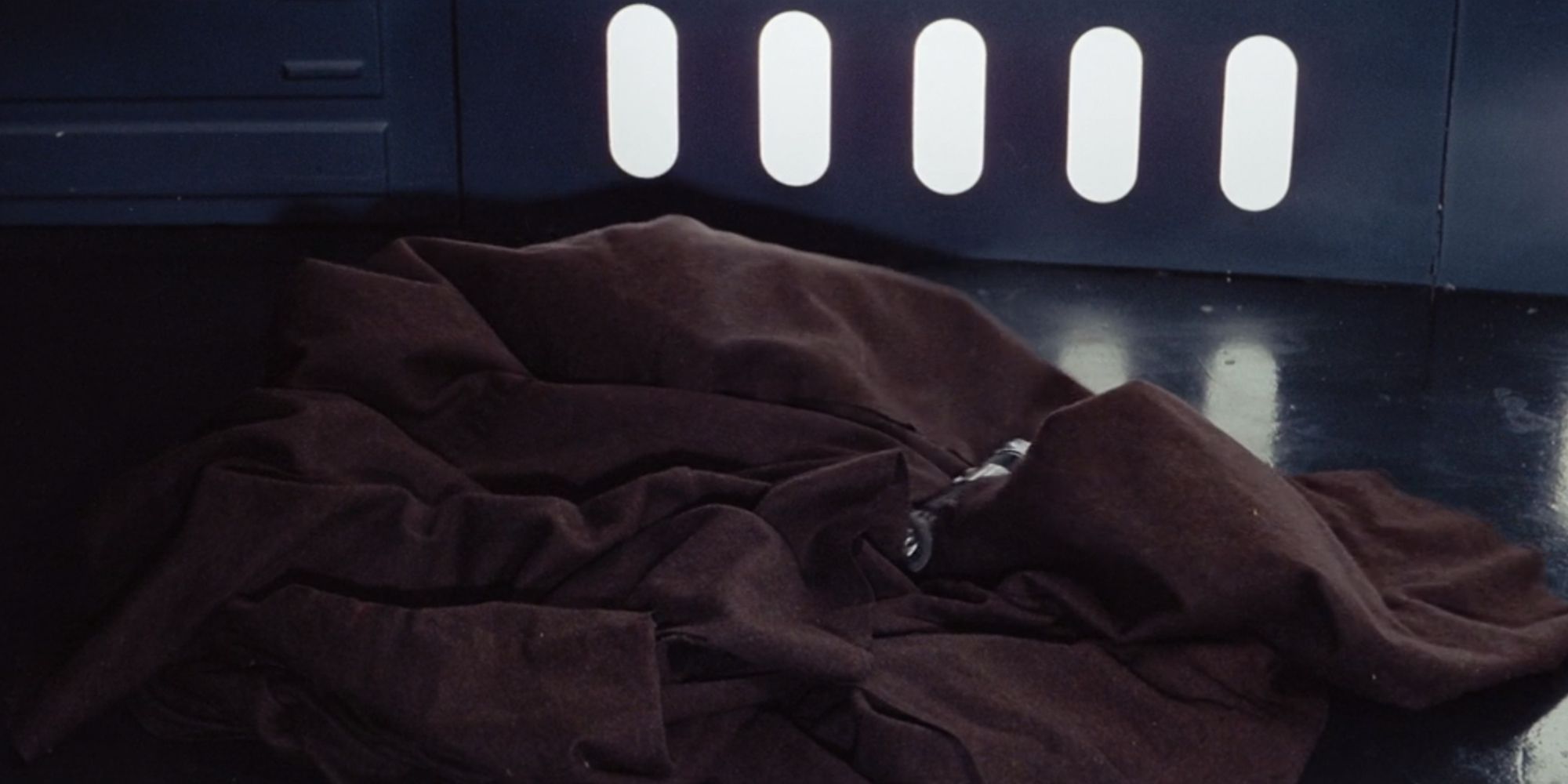 Obi-Wan Kenobi's lightsaber and robe in A New Hope
