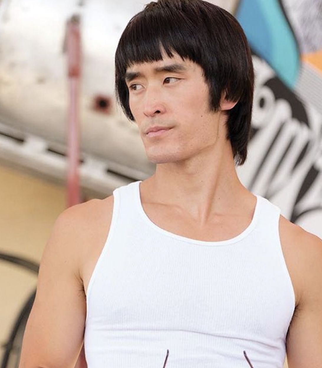 Mike Moh as Bruce Lee Vertical