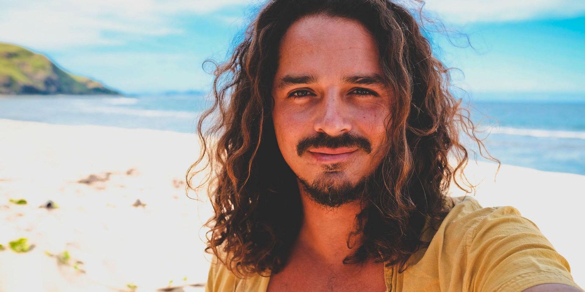 Ozzy Lusth from Survivor smiling at the camera