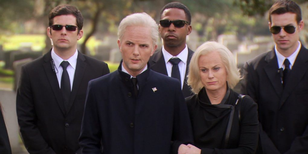 Ben (Adam Scott) and Leslie (Amy Poehler) at Jerry's funeral