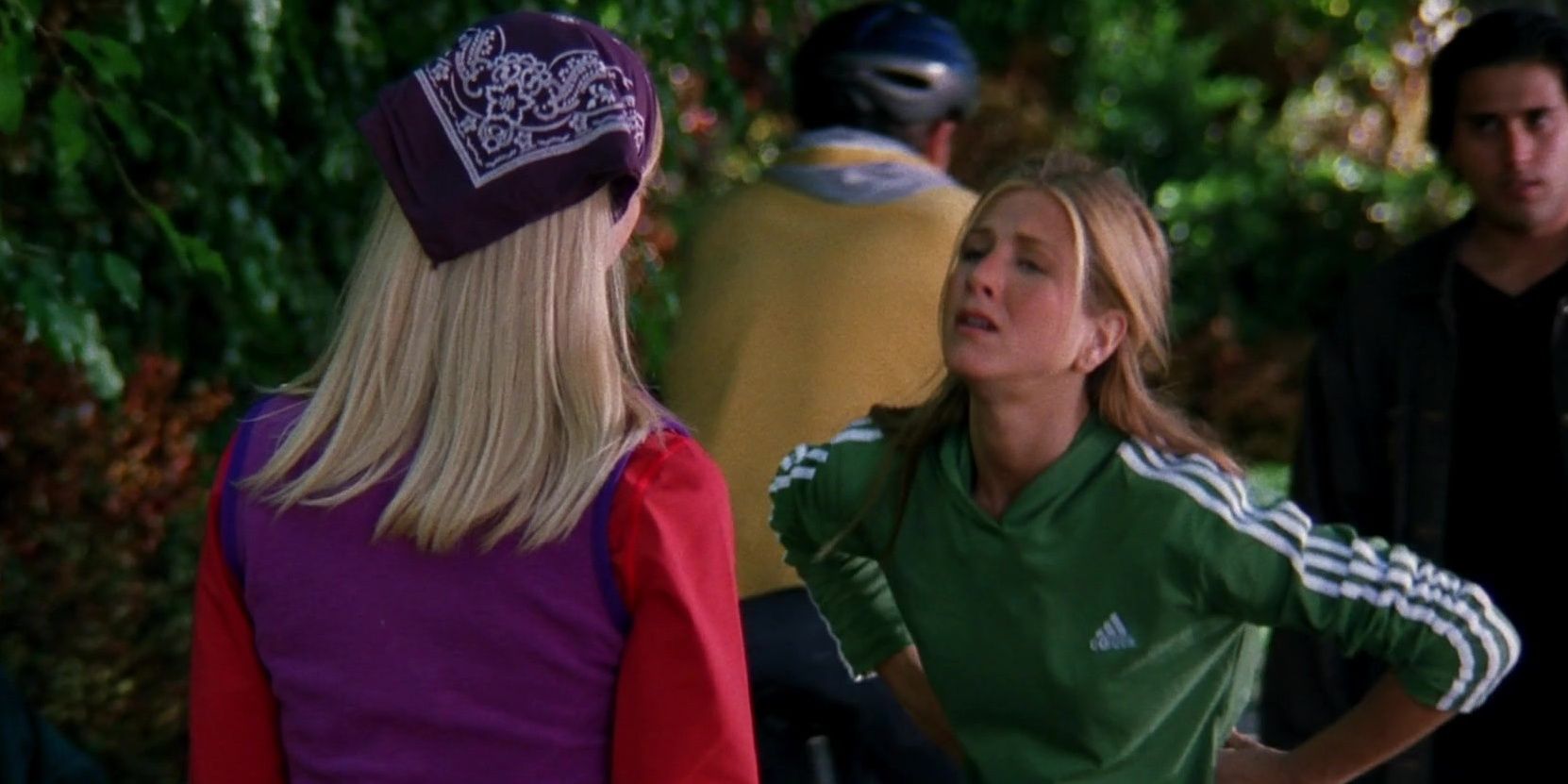 Phoebe talking to Rachel in workout clothes on Friends