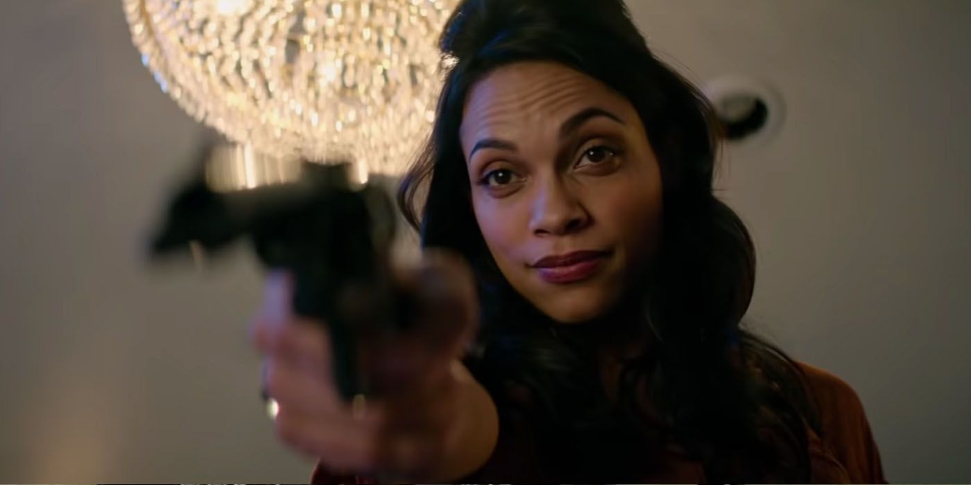 Rosario Dawson holding a gun in Zombieland 2