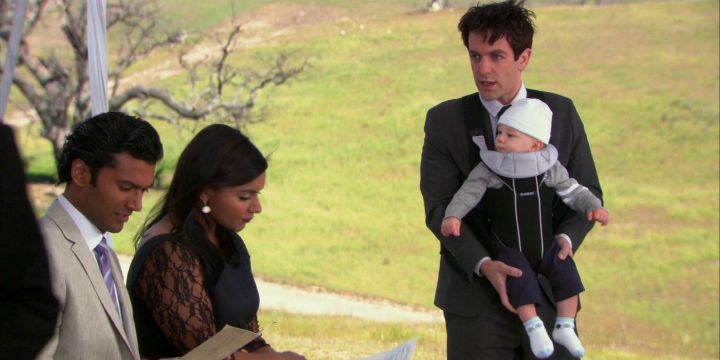 Ryan Howard with his son in a baby bjorn on The Office.