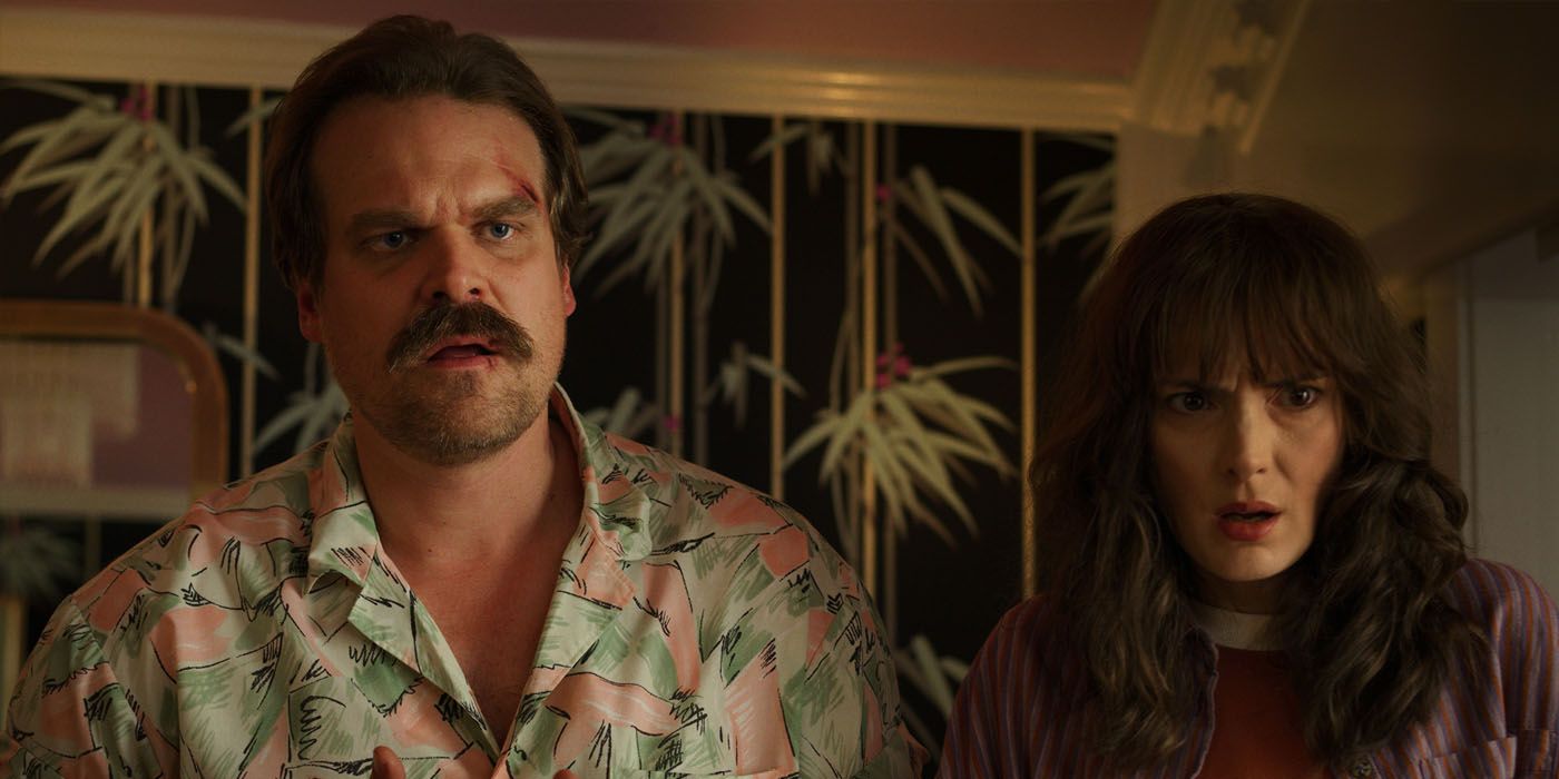 Hopper and Joyce looking surprised in Stranger Things