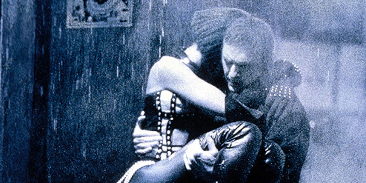Kevin Costner carries Whitney Houston in a scene from The Bodyguard