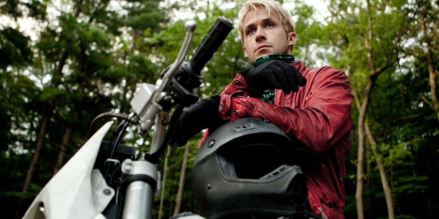 Ryan Gosling sitting on a motorcycle in The Place Beyond the Pines