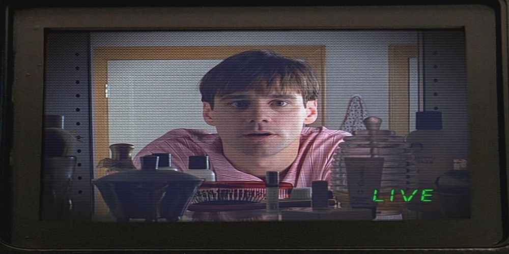 Truman looking in the mirror camera in The Truman Show