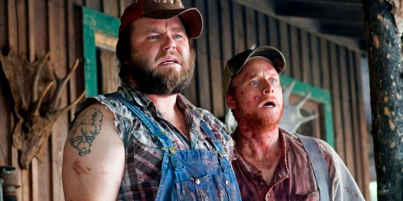 Tucker and Dale standing on their porch in Tucker and Dale vs Evil