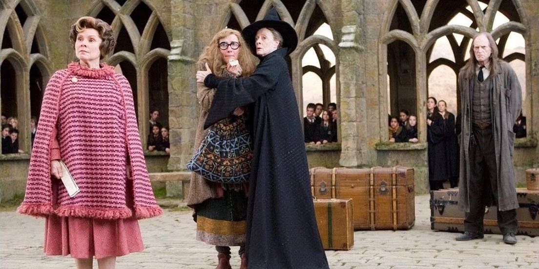 McGonagall comforting Trelawney as Umbridge addresses the school in Harry Potter. 