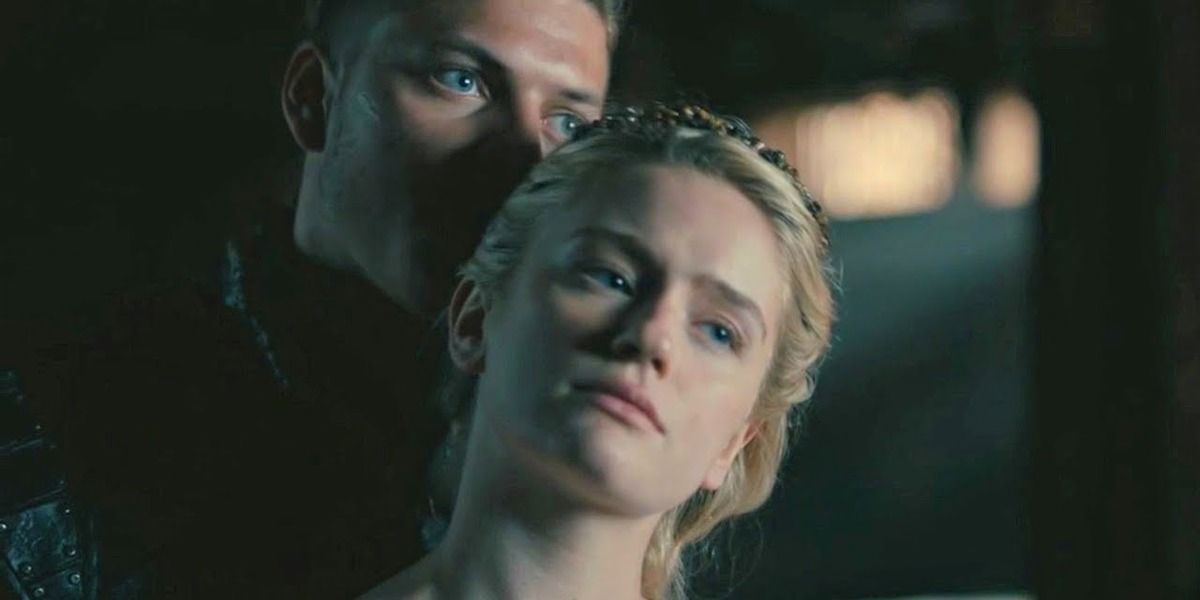 Freydis and Ivar embrace in Vikings while looking into the distance.
