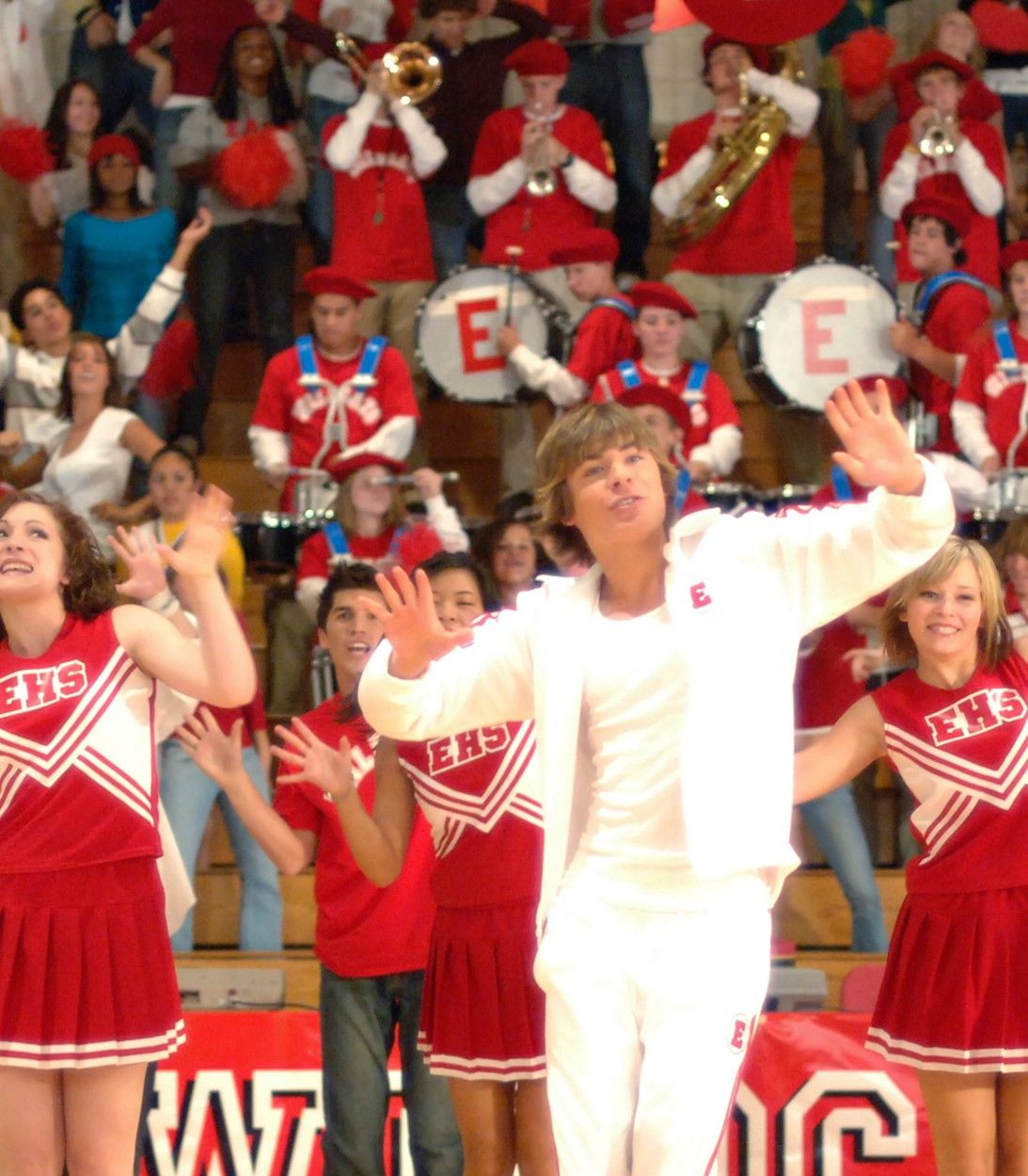 Zac Efron as Troy and Vanessa Hudgens as Gabriella in High School Musical vertical