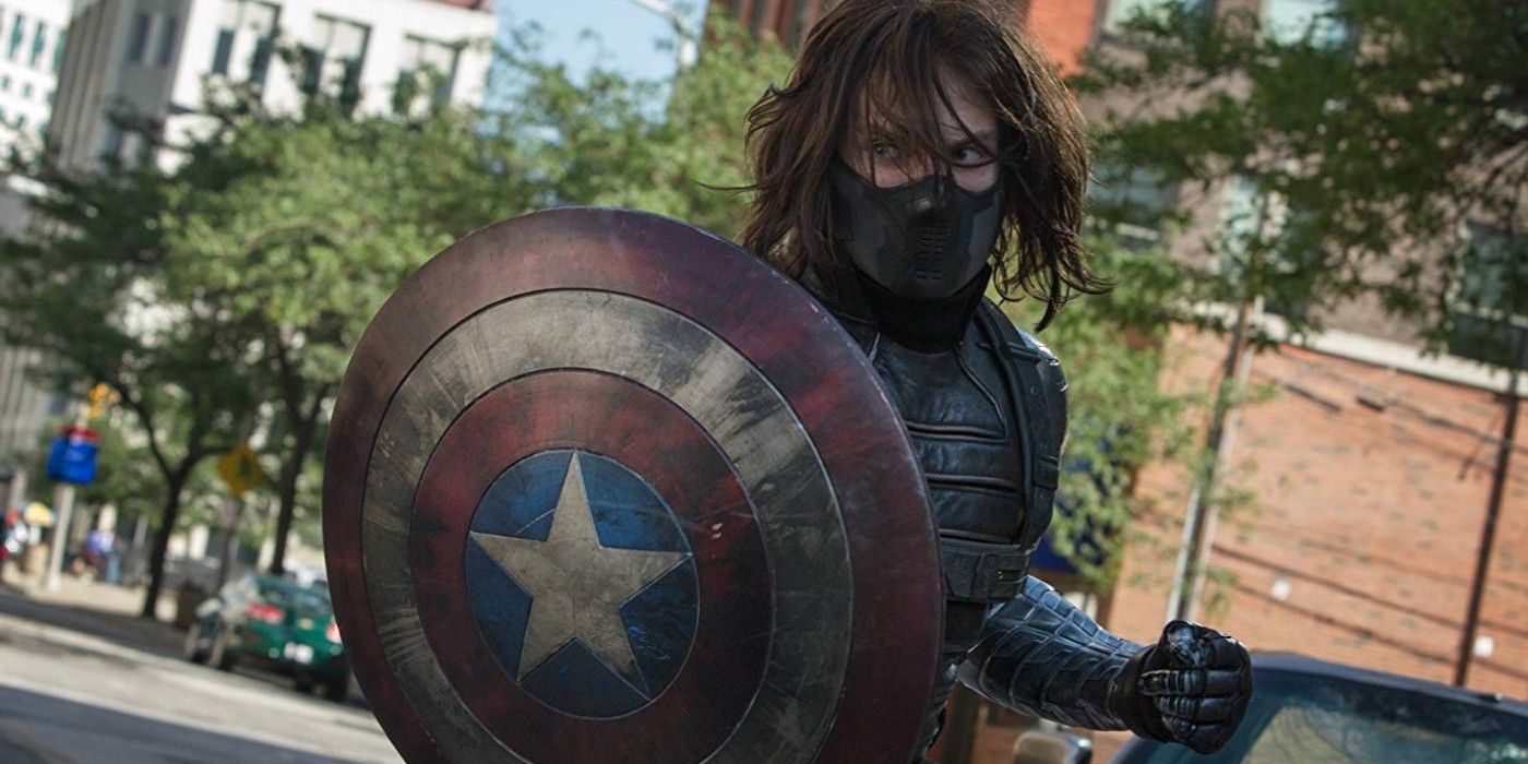 Winter Soldier holding Cap's shield while fighting on the street in Captain America: The Winter Soldier.