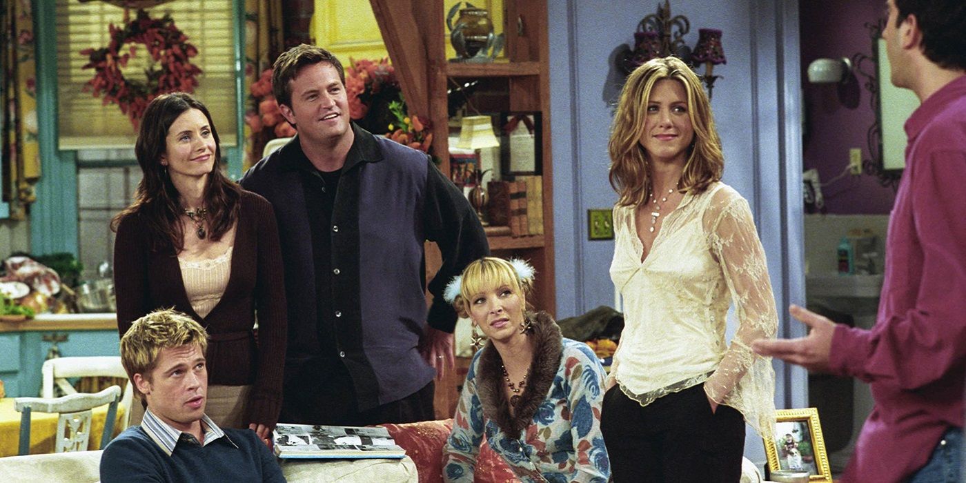 The Friends gang and Will Colbert (Brad Pitt) hang out at Monica's apartment. 