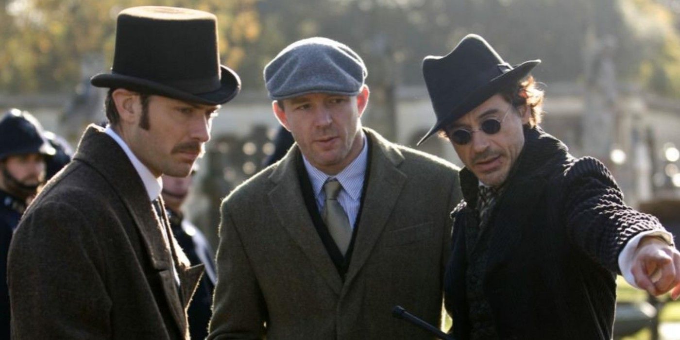 Guy Ritchie on the set of Sherlock Holmes with Robert Downey Jr and Jude Law