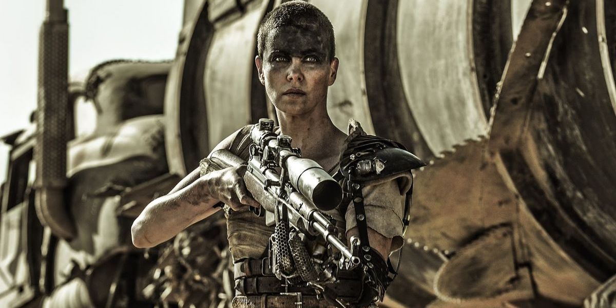 Furiosa aiming a gun in Mad Max: Fury Road