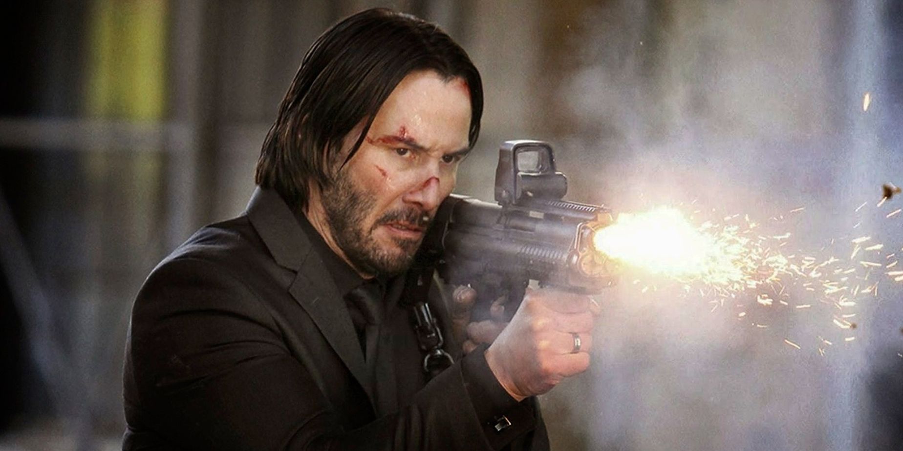 John Wick firing a shotgun