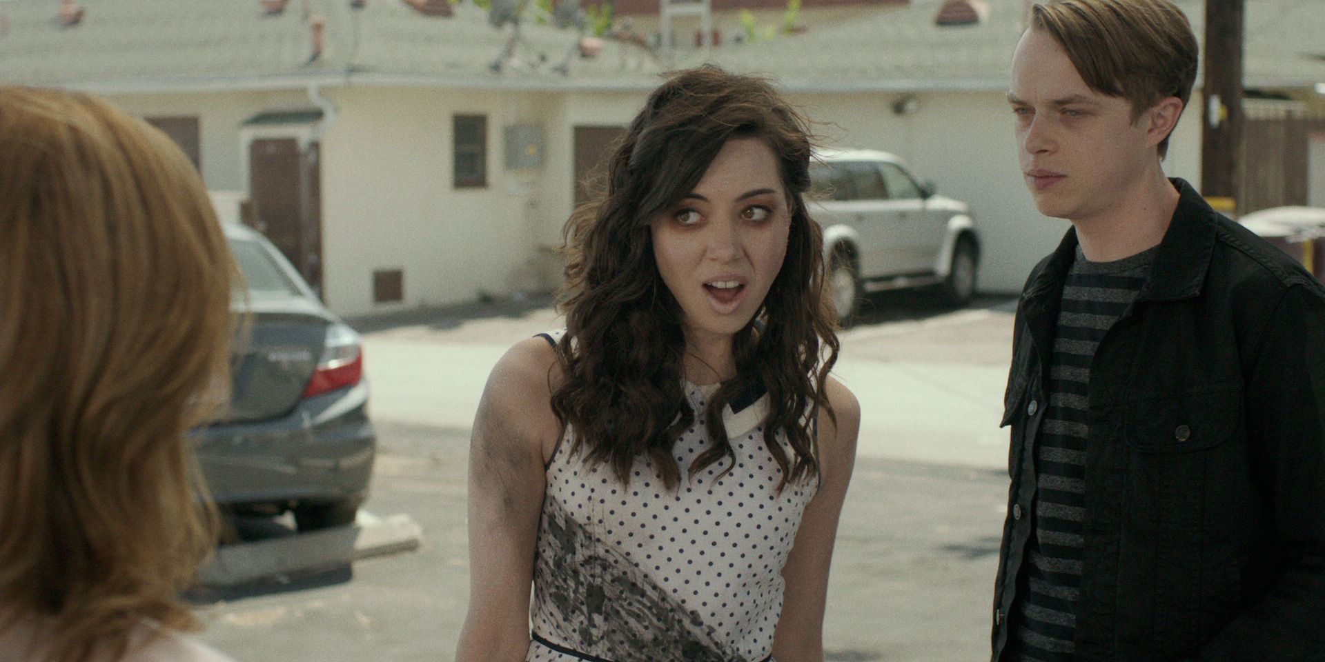 Zach watches as Beth talks to someone in Life After Beth