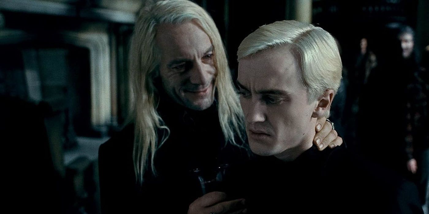 Lucius e Draco Malfoy em relíquias da morte harry potter parte 1