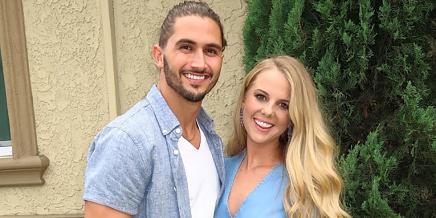 Nicole Franzel and Victor Arroyo from Big Brother pose together and smile for the camera