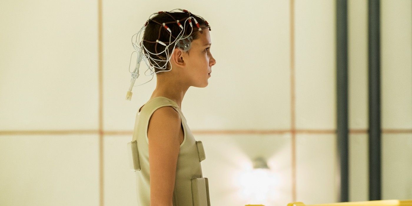 Eleven with a monitor on her head in Stranger Things