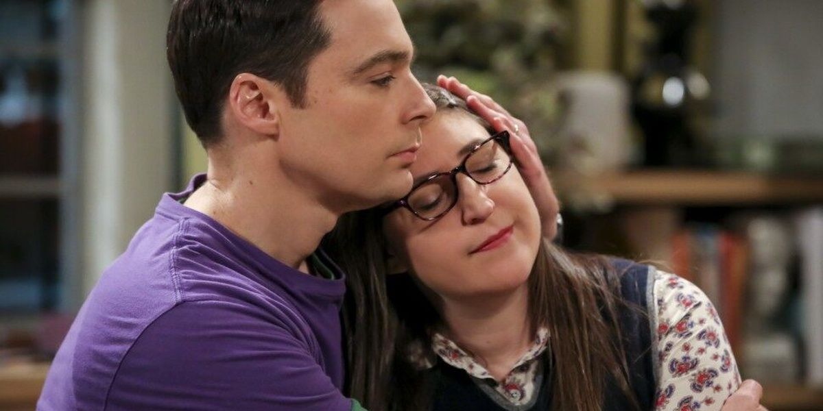 Sheldon and Amy hold each other in The Big Bang Theory.