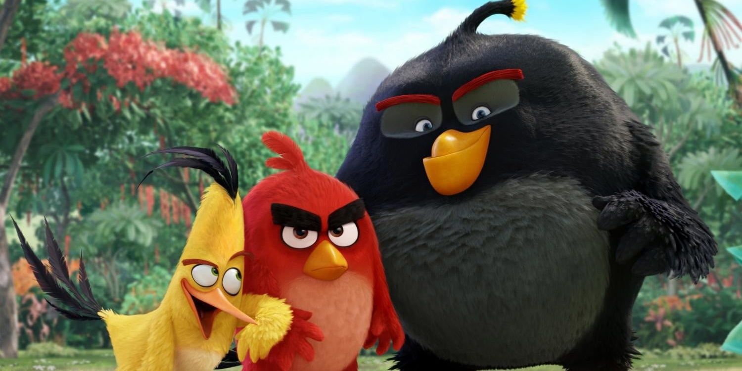 Red posing with Chuck and Bomb in a still from The Angry Birds Movie