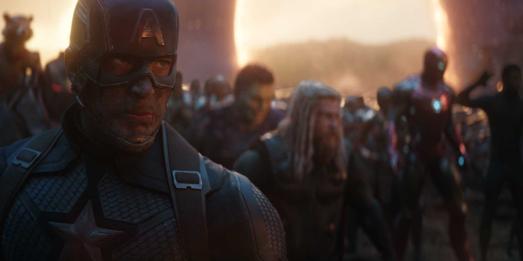 Captain America stands with the rest of the Avengers behind him ready for battle