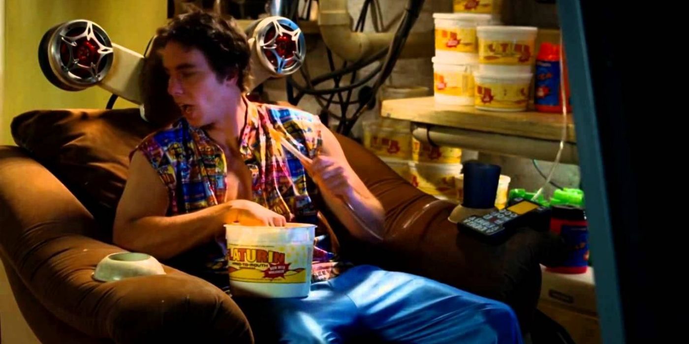 Idiocracy eating snacks from a bucket