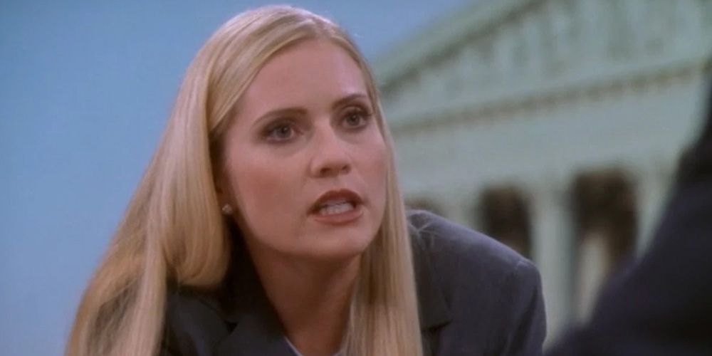 Ainsley Hayes talking to someone in The West Wing.