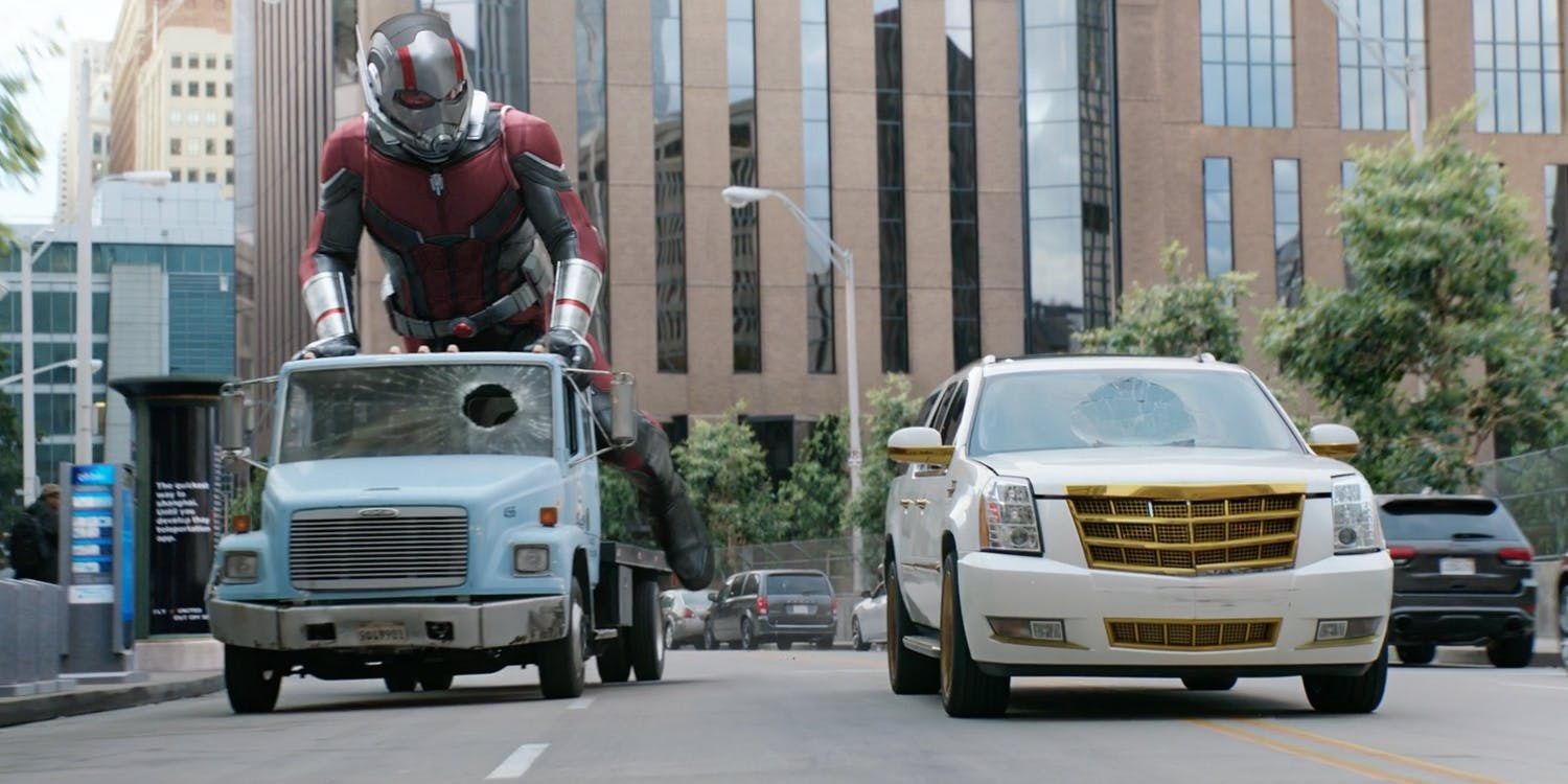 Scott rides on a car in the Ant-Man and the Wasp car chase