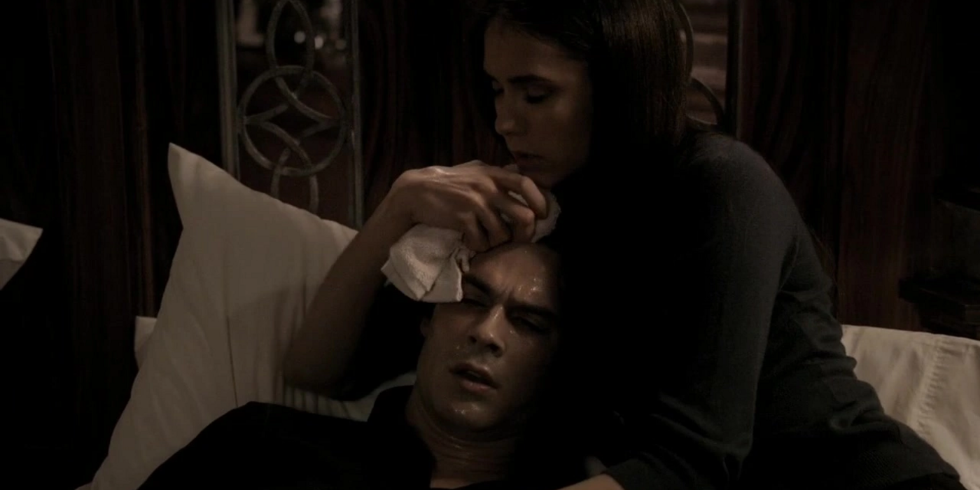 Elena comforts a dying Damon