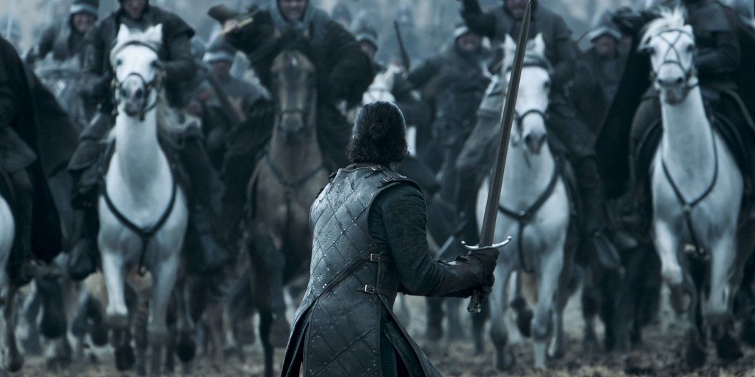 Jon Snow facing charging horses in Game of Thrones