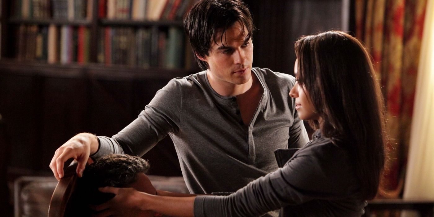 An image of Damon looking at Bonnie in The Vampire Diaries