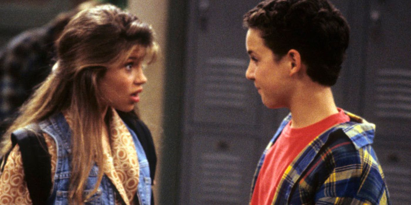 Topanga and Cory talking and looking surprised on Boy Meets World