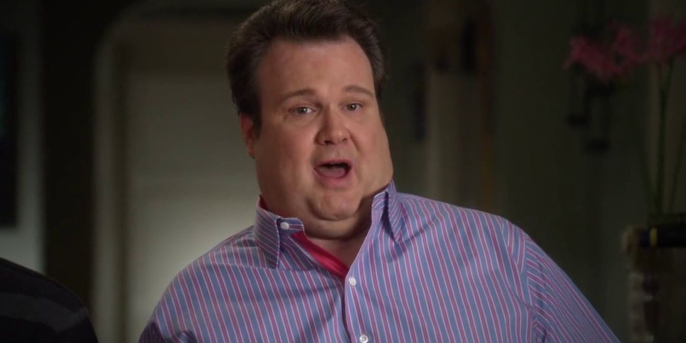 Cam looking surprised while talking to the camera in Modern Family