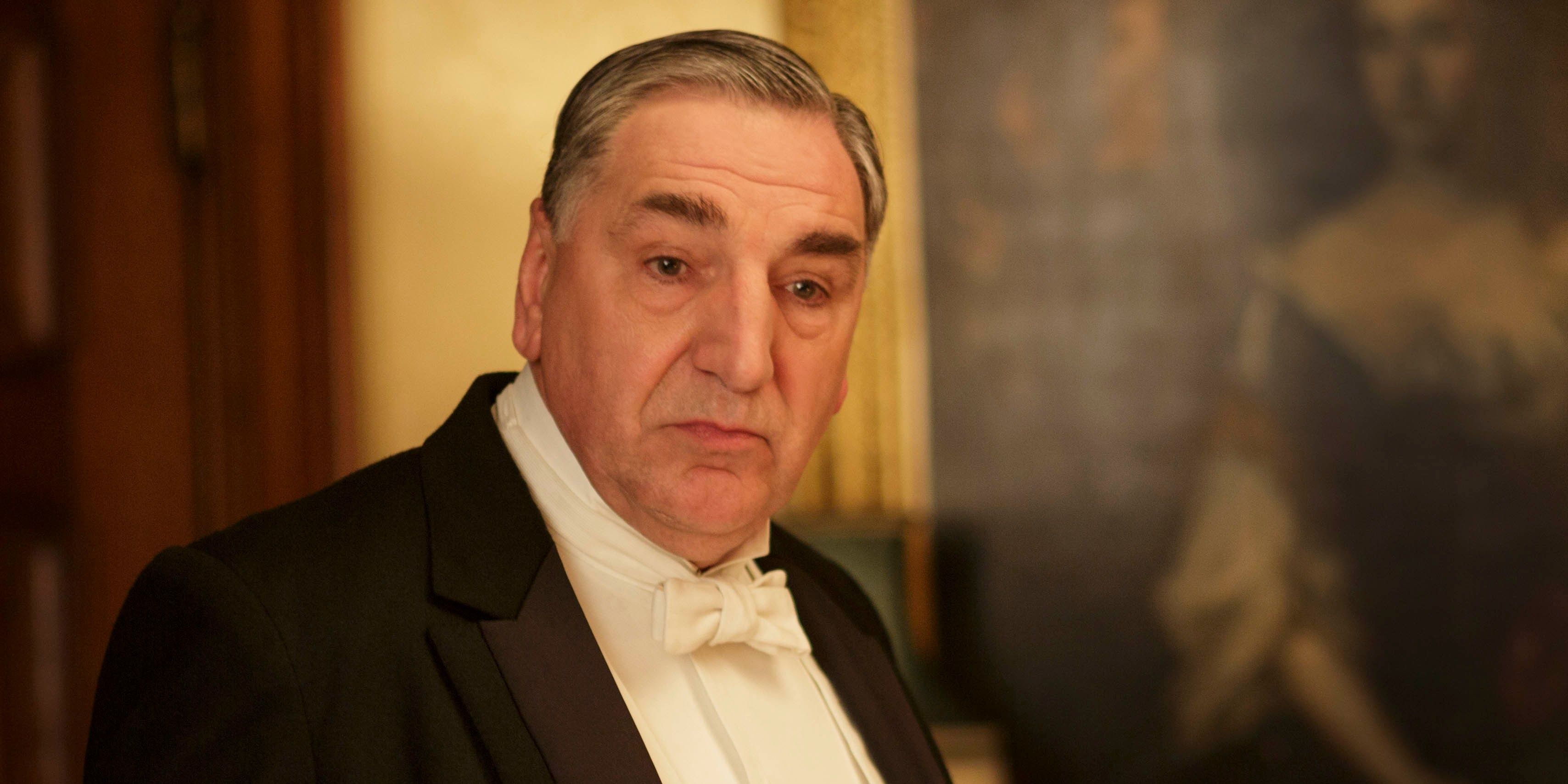 Carson at dinner in Downton Abbey.