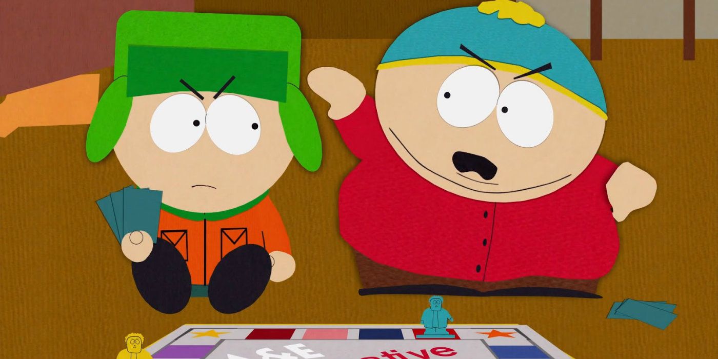 Cartman angrily waving his hand at Kyle who's holding cards in South Park.