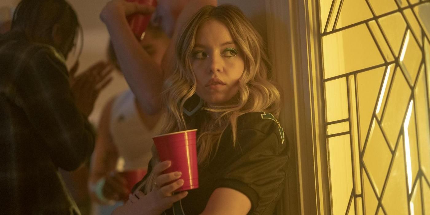 Cassie looking angry with a red cup in Euphoria