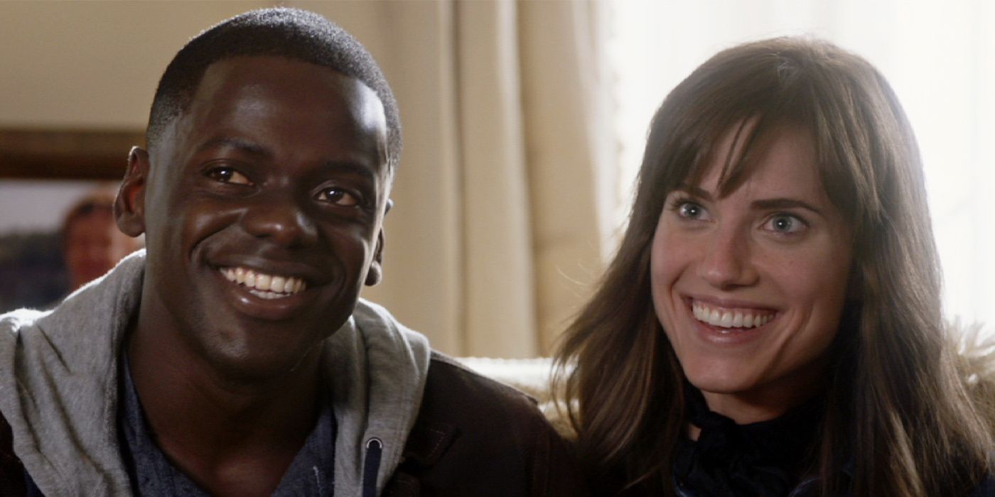 Chris and Rose sitting on a couch in Get Out