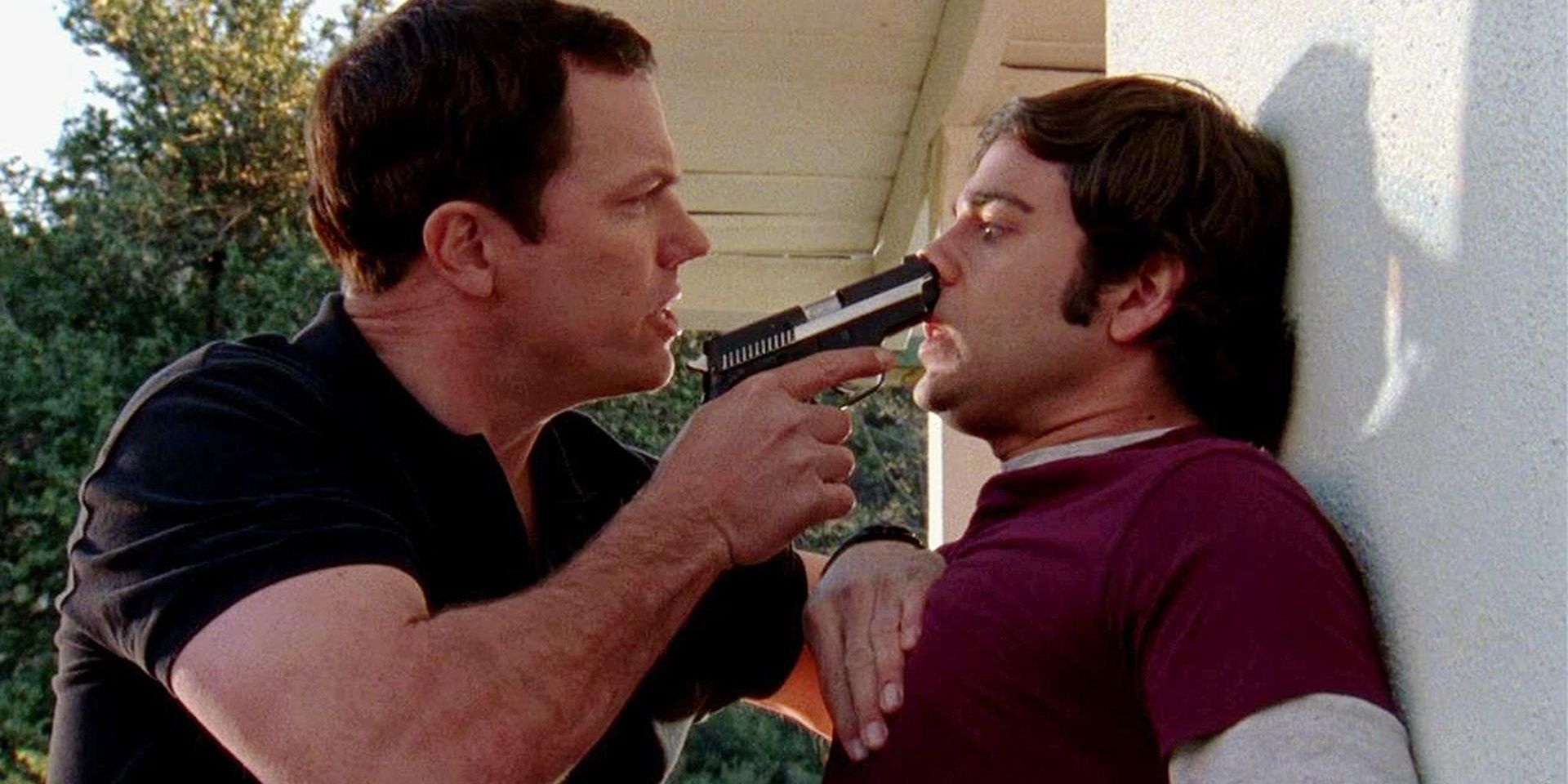 Casey holds a gun to Chuck's face