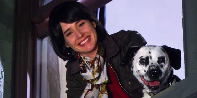 Cobie Smulders as an aged Robin looking out of her window with her dog to Ted in How I Met Your Mother's finale.