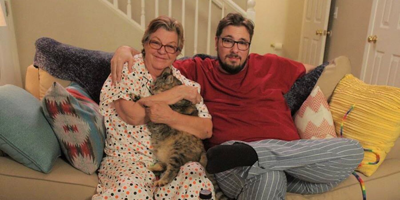 Colt Johnson and mother Debbie Johnson on 90 Day Fiancé: Pillow Talk on couch with cat