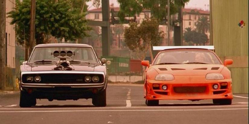 Brian e Dom evitano di poco un treno in The Fast and the Furious