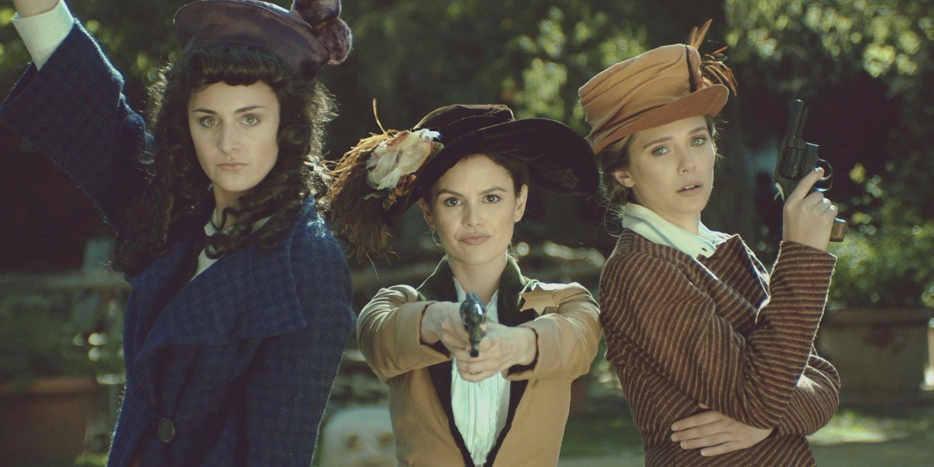 The Kopp sisters posing with their weapons in Drunk History.
