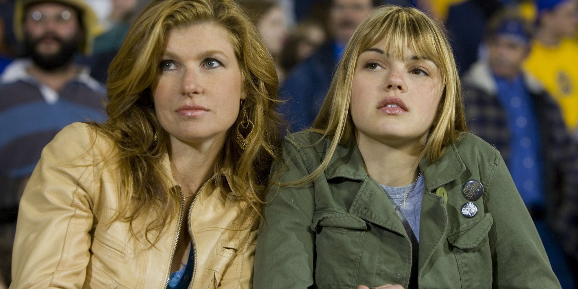 Tami and Julie watching a football game together on Friday Night Lights