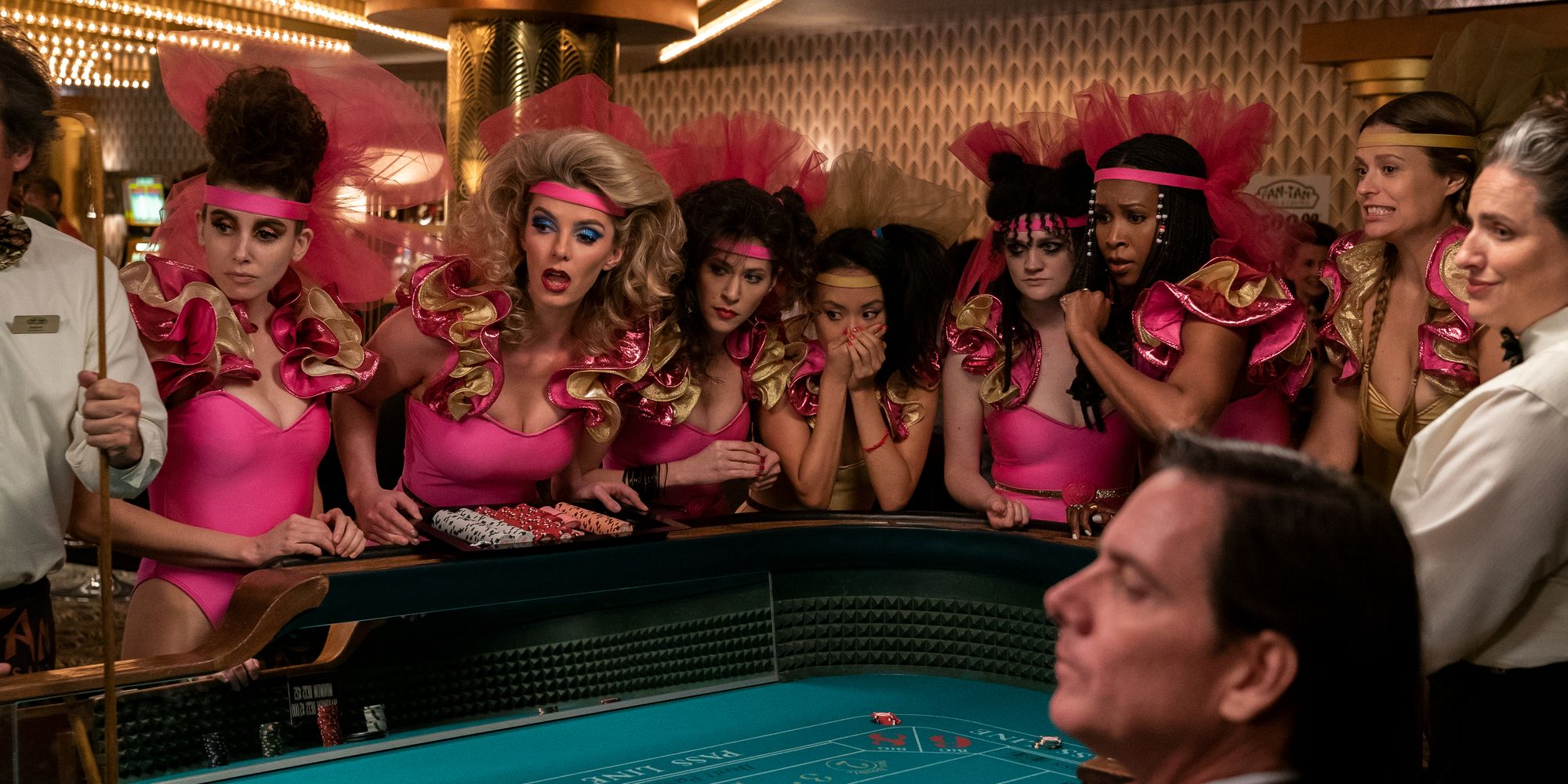 The ladies of GLOW play craps at a casino