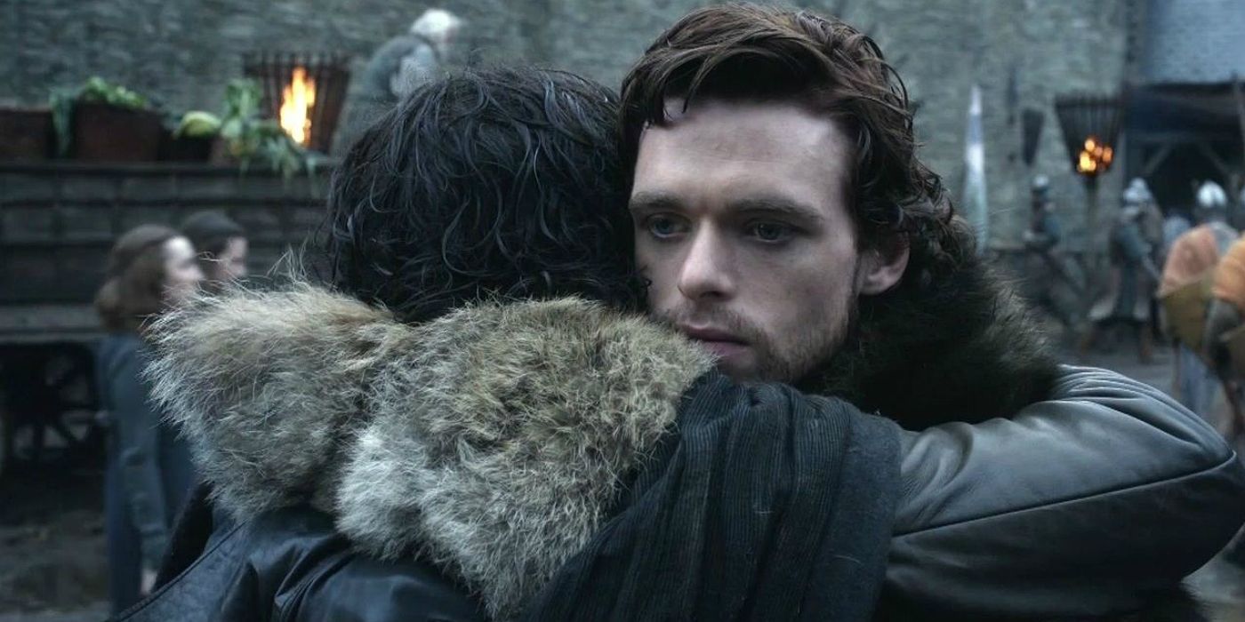 Jon Snow and Robb Stark hug in Game of Thrones