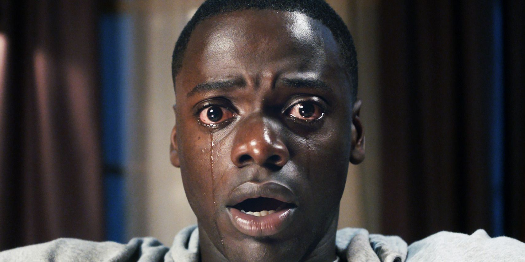Chris crying and looking scared in Get Out