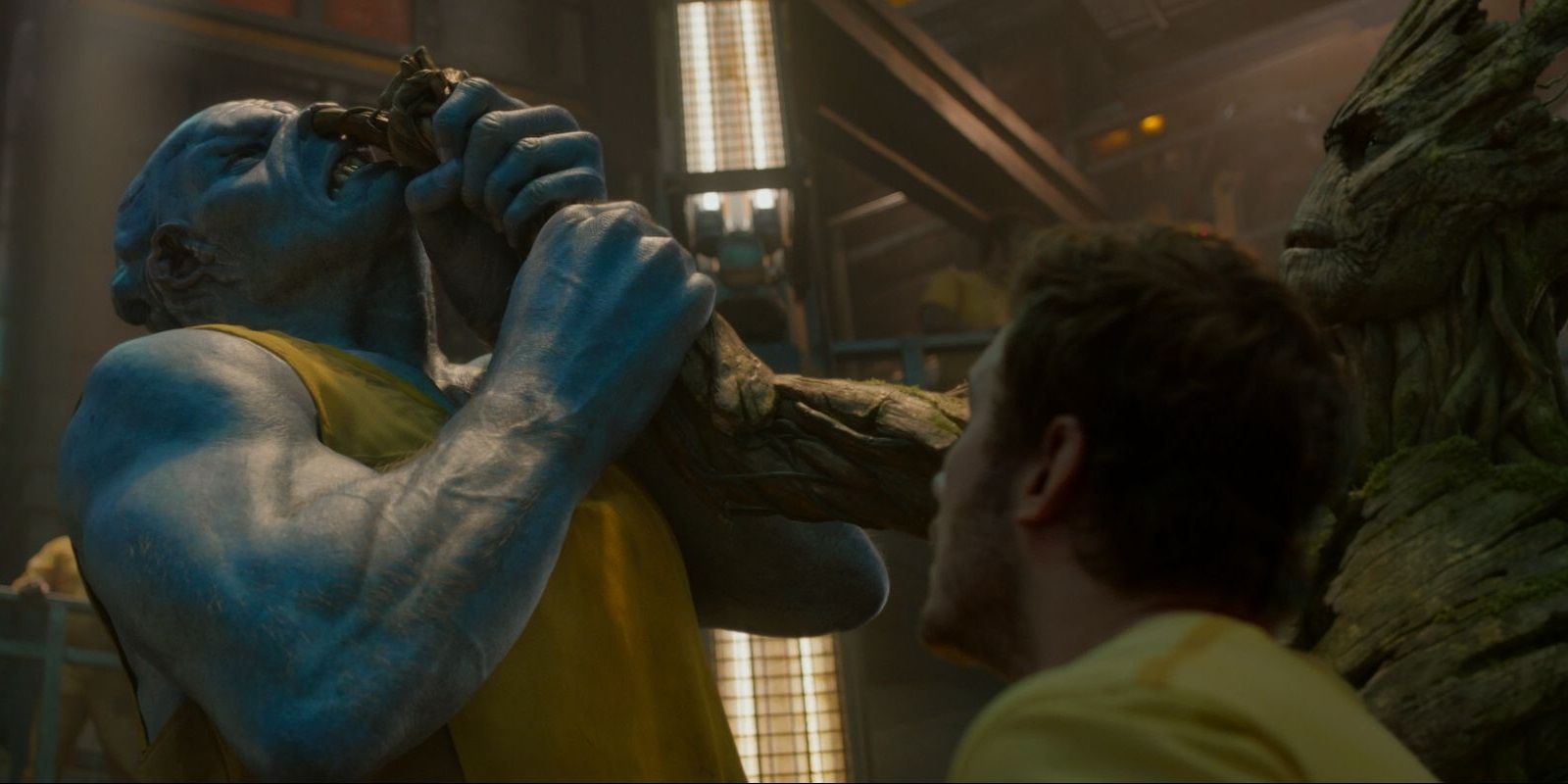 Groot fights an alien in the Kyln