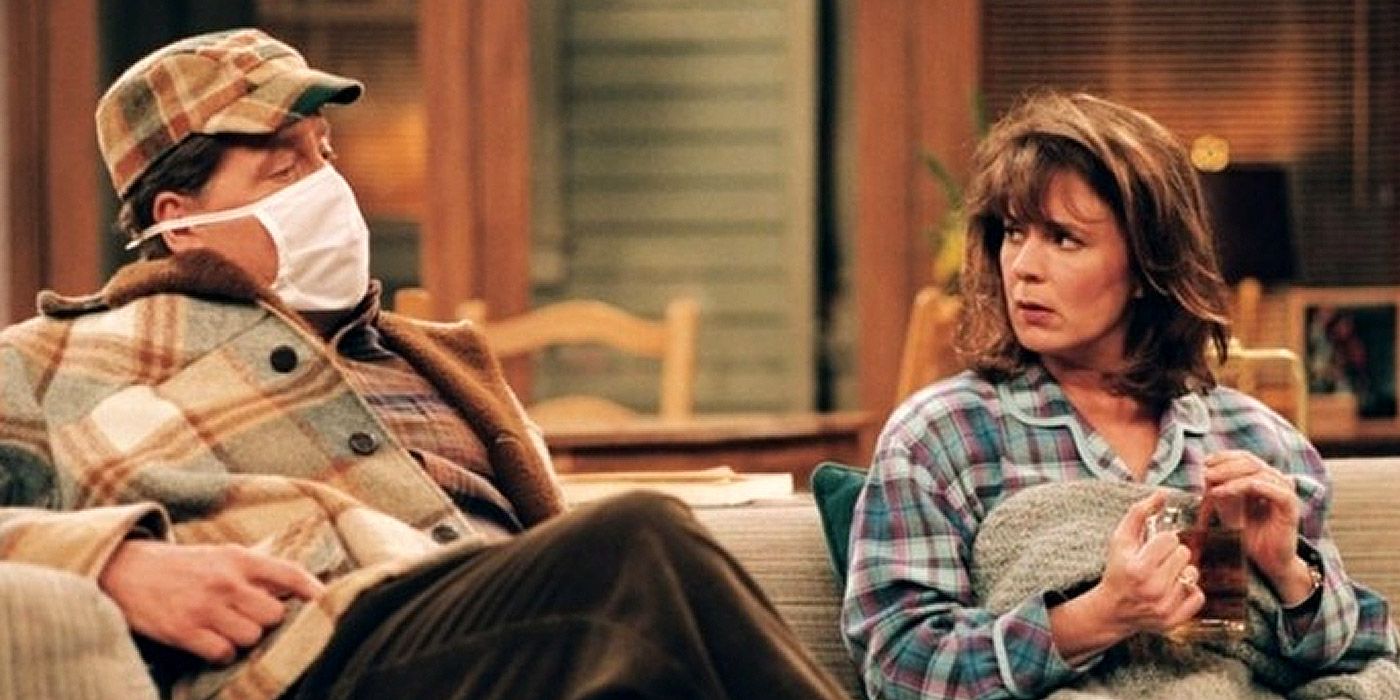 Wilson wearing a face mask while talking to Jill in Home Improvement